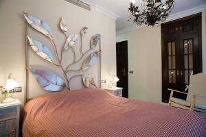 Łóżko lub łóżka w pokoju w obiekcie Hotel Coral Playa