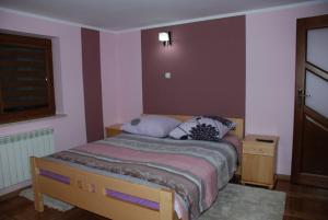 Posteľ alebo postele v izbe v ubytovaní Domek Na Wierchu i Apartament na Wierchu