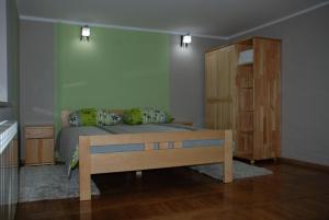 Posteľ alebo postele v izbe v ubytovaní Domek Na Wierchu i Apartament na Wierchu