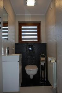 Kúpeľňa v ubytovaní Domek Na Wierchu i Apartament na Wierchu