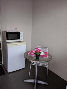 Kuchyň nebo kuchyňský kout v ubytování Hotel Fleur de Lys