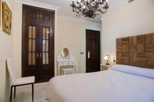 Łóżko lub łóżka w pokoju w obiekcie Hotel Coral Playa