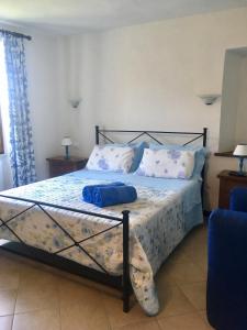 Postel nebo postele na pokoji v ubytování Agriturismo La Ferriera