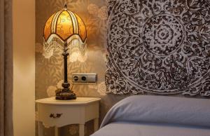 Łóżko lub łóżka w pokoju w obiekcie Hotel Coral Playa