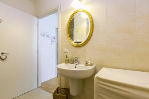 Et badeværelse på La Maison della piazzetta + 3 billeder