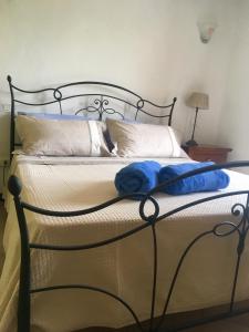 Postel nebo postele na pokoji v ubytování Agriturismo La Ferriera
