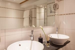 A bathroom at Hotel Walliserhof Zermatt