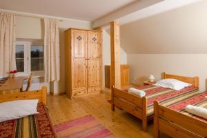 Ένα ή περισσότερα κρεβάτια σε δωμάτιο στο Saare Manor Guesthouse