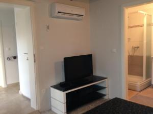 TV a/nebo společenská místnost v ubytování Rooms Grof