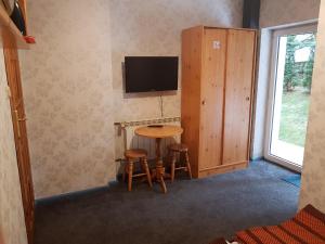 Telewizja i/lub zestaw kina domowego w obiekcie Willa Emilia