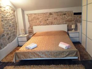 Postel nebo postele na pokoji v ubytování Rooms Grof