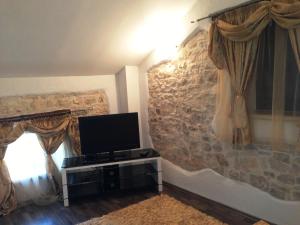 TV a/nebo společenská místnost v ubytování Rooms Grof