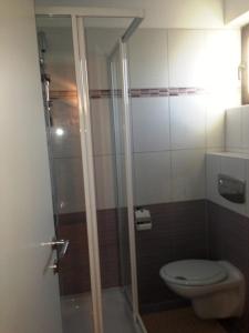 Koupelna v ubytování Rooms Grof