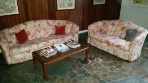 Posezení v ubytování Flat Condominio Gaivotas Alcobaça BA a 100 metros do mar