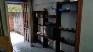 Kuchyň nebo kuchyňský kout v ubytování Flat Condominio Gaivotas Alcobaça BA a 100 metros do mar