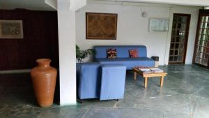 Posezení v ubytování Flat Condominio Gaivotas Alcobaça BA a 100 metros do mar