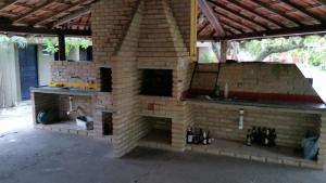Kuchyň nebo kuchyňský kout v ubytování Flat Condominio Gaivotas Alcobaça BA a 100 metros do mar
