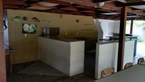 Kuchyň nebo kuchyňský kout v ubytování Flat Condominio Gaivotas Alcobaça BA a 100 metros do mar