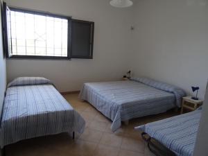 Un ou plusieurs lits dans un hébergement de l'établissement Sabell
