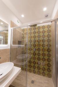 Koupelna v ubytování Suites Sorrento Elegance