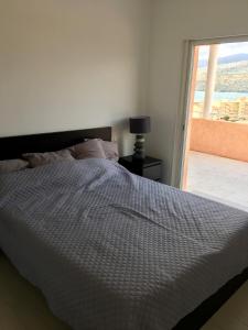 Una cama o camas en una habitación de I Tre Sirenelli