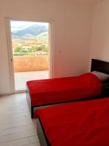 Ein Bett oder Betten in einem Zimmer der Unterkunft I Tre Sirenelli