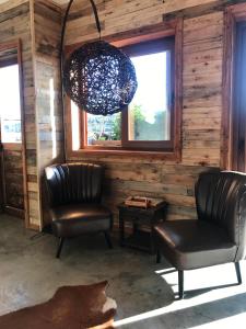 Posezení v ubytování Hotel 381 Panguipulli