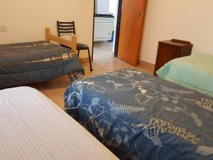 En eller flere senge i et værelse på Cabañas Años Verdes