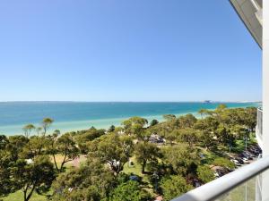 a view of the ocean from the balcony of a condo at Nautilus by Rockingham Apartments in Rockingham