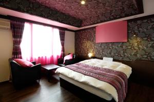Letto o letti in una camera di Hotel Sunset (Adult Only)