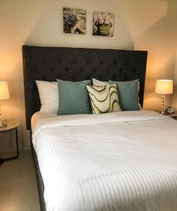 Ένα ή περισσότερα κρεβάτια σε δωμάτιο στο One Bedroom Apartment at Sundance Residences with Hi-Speed WiFi
