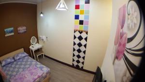 Llit o llits en una habitació de 龍園旅館Long Yuan Hotel