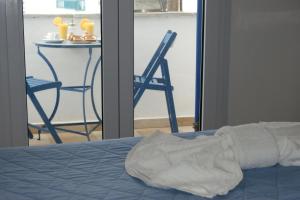 Postel nebo postele na pokoji v ubytování Pension Verykokkos