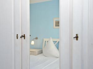 Ένα ή περισσότερα κρεβάτια σε δωμάτιο στο Haus Möwe - Apt. 013