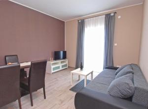 TV a/nebo společenská místnost v ubytování Luna