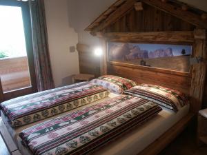 Postel nebo postele na pokoji v ubytování Aria D'Bosch