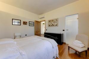 A bed or beds in a room at B&B Il Ramaiolo