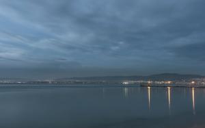 a view of a large body of water at night at Hotel Avra in Perea