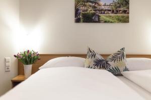 Postel nebo postele na pokoji v ubytování martas Hotel Allegra Berlin