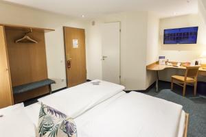 Postel nebo postele na pokoji v ubytování martas Hotel Allegra Berlin