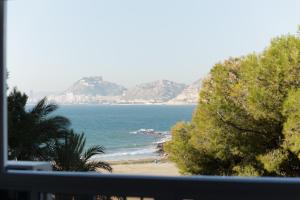 a view of the ocean from a balcony at Apartamento Santa Barbara I in Alicante