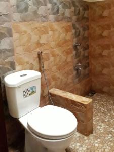Koupelna v ubytování Dabdab Tourist Inn