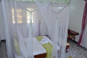 Postel nebo postele na pokoji v ubytování Sheevy"s Bed N Breakfast + 22 fotografií