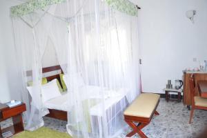 Postel nebo postele na pokoji v ubytování Sheevy"s Bed N Breakfast