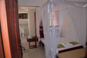 Postel nebo postele na pokoji v ubytování Sheevy"s Bed N Breakfast