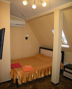 Giường trong phòng chung tại Olimp