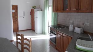 Kuchyň nebo kuchyňský kout v ubytování Hideaway Flats