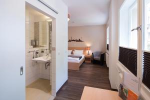 Postel nebo postele na pokoji v ubytování Hotel Morgenland