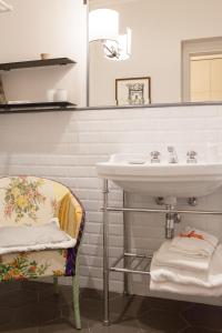 Ett badrum på Verdi Apartments