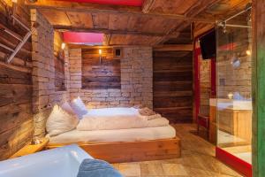 Letto o letti in una camera di Chalet Schwalbennest